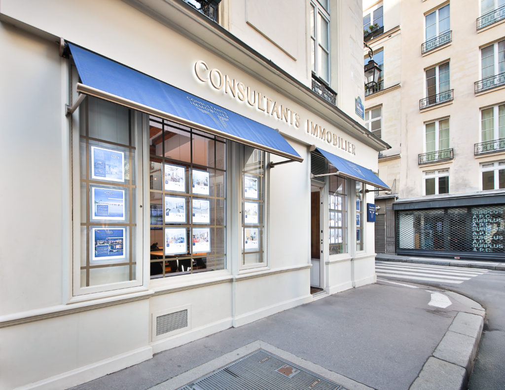 Façade de l’agence Consultants Immobilier, rue Jacob à Paris